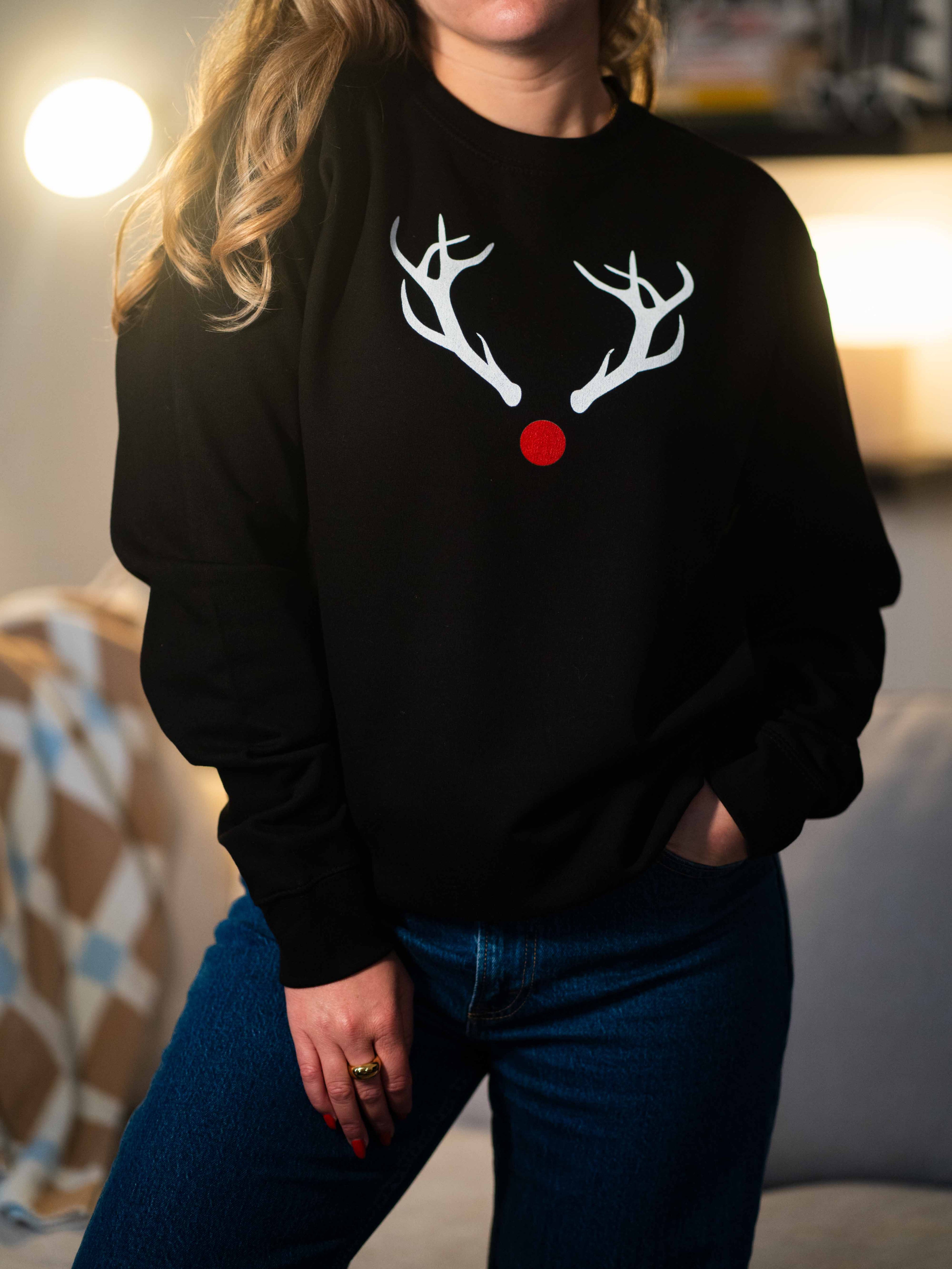 woman wearing christmas jumper