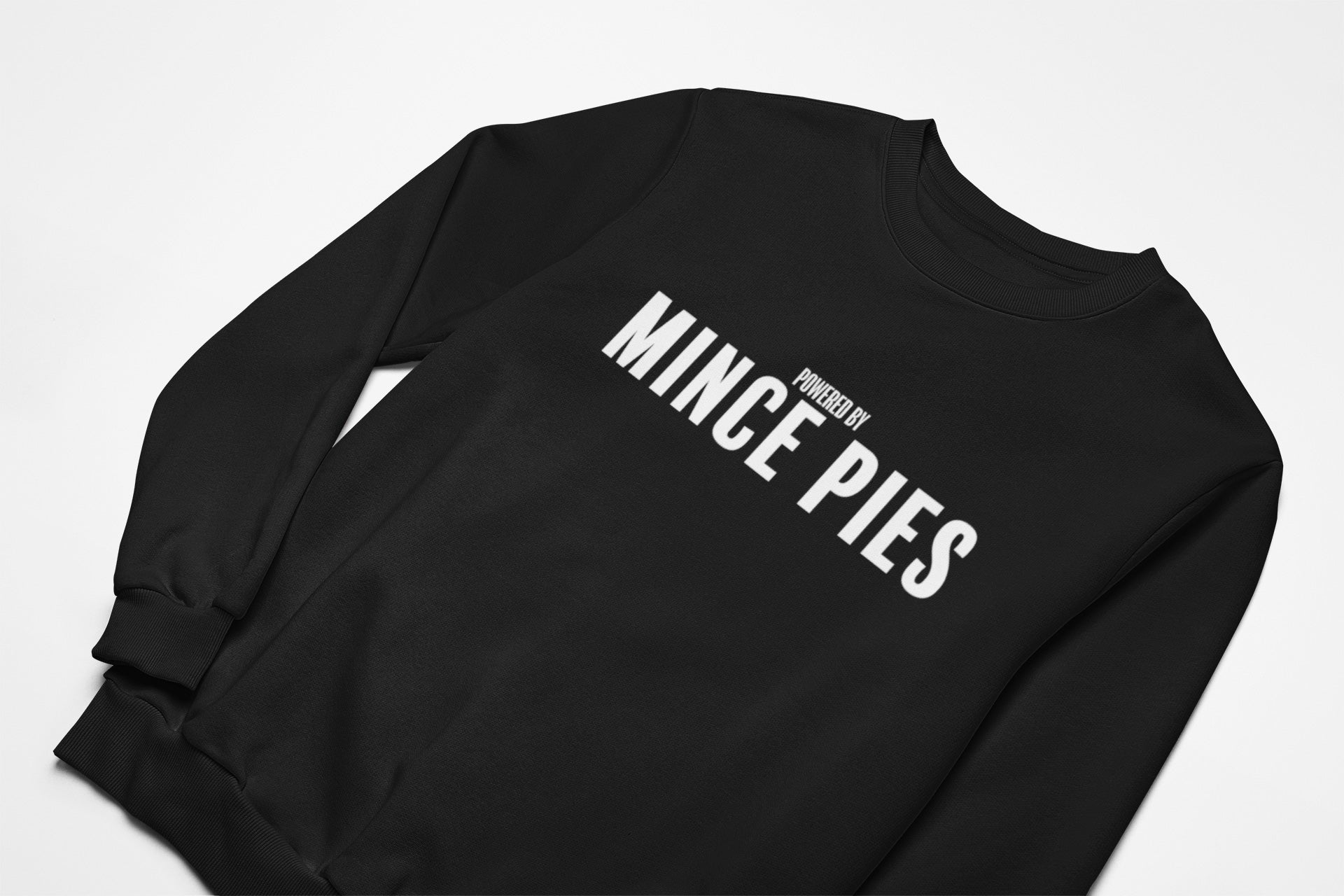 Powered by mince pies christmas jumper in black